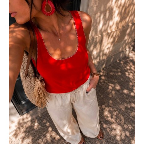 Top rouge liseré argenté